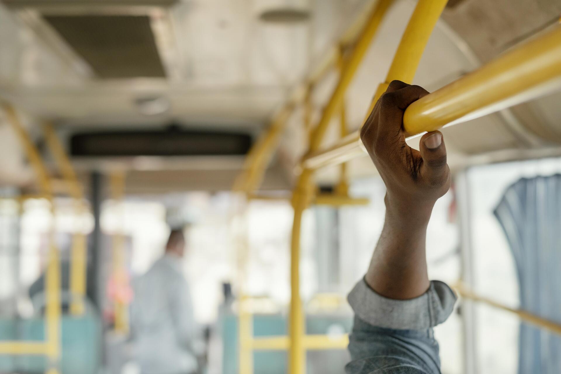 close-up-hand-holding-bus-bar (1)